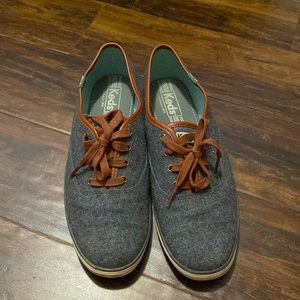 Keds, size 9 1/2. Gray with brown leather trim. Has both brown and gray laces.
